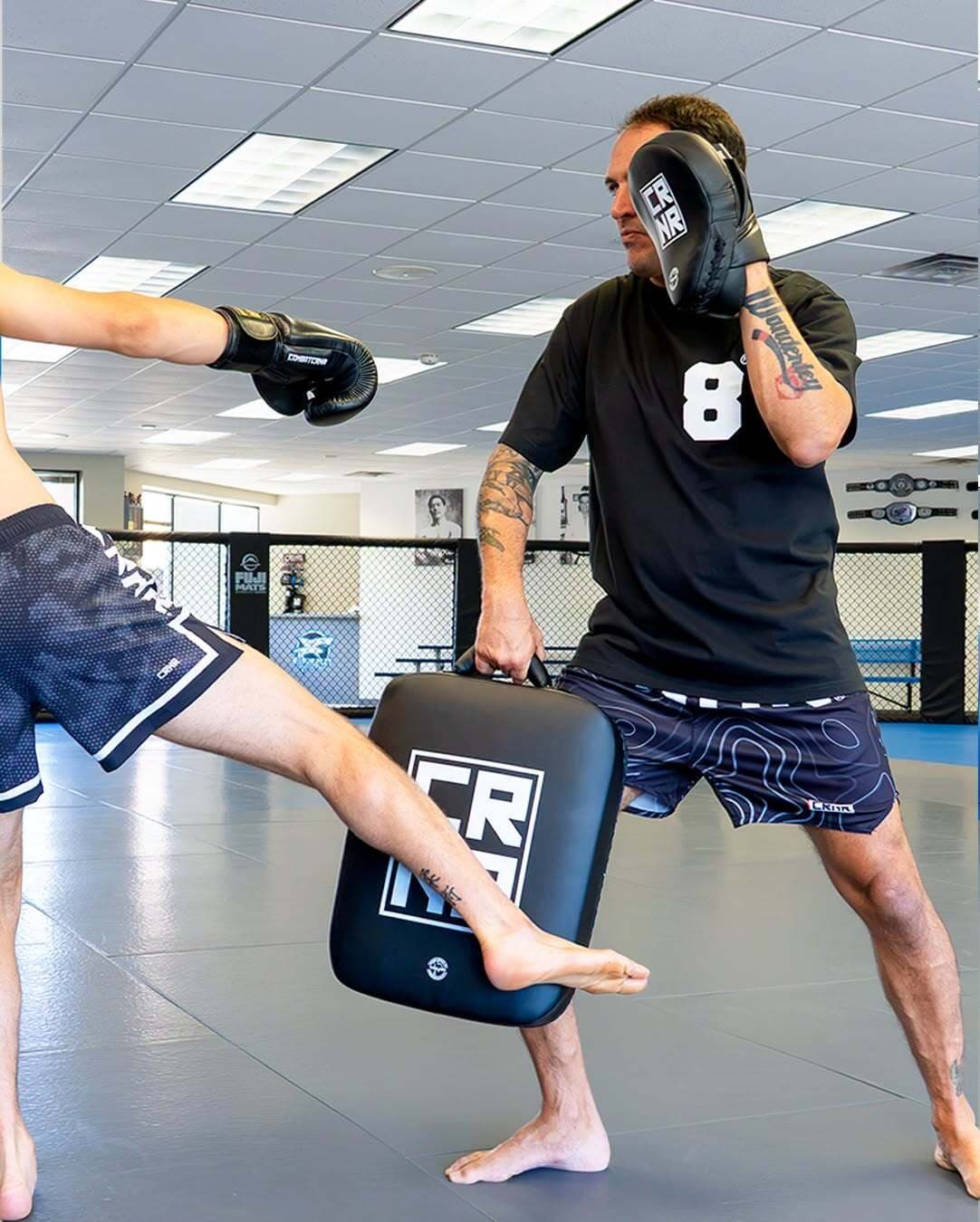 Kickboxing class pad work photo
